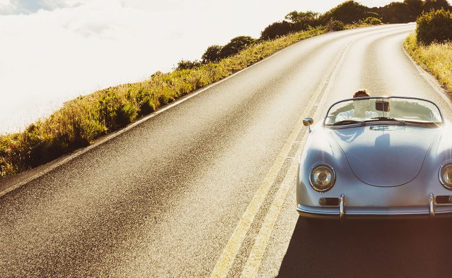 Porsche on road - hero